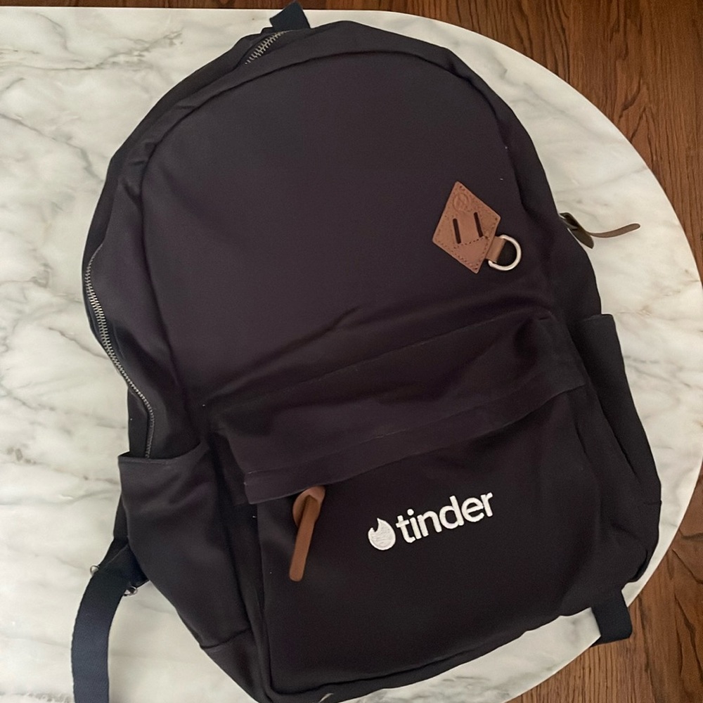Navy Blue Backpack with Tinder logo